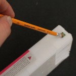 Cleaning the Epson Ink Cartridge chip with a pencil eraser